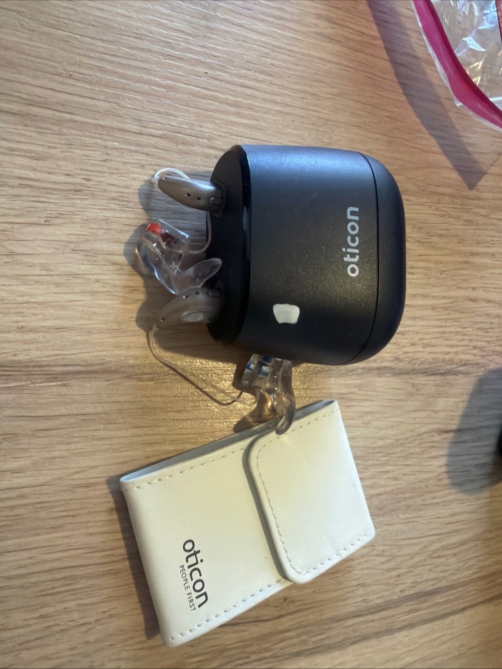 ICON Black Hearing Aids also a charger with White Carry Pouch